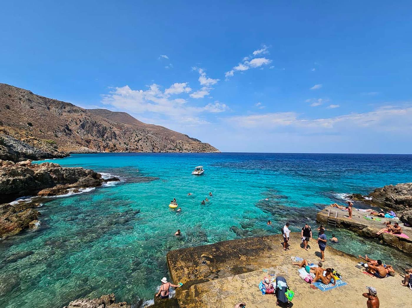 Head Towards the Azure Depths: Explore Omprogialos (octopus bay) by Boat!
